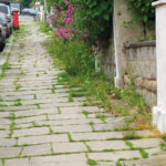 From Potholes to Pavements Health and Environment
