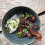 Crispy chilli fried mushrooms with pickled kohlrabi, ginger and cucumber salad Food & Drink