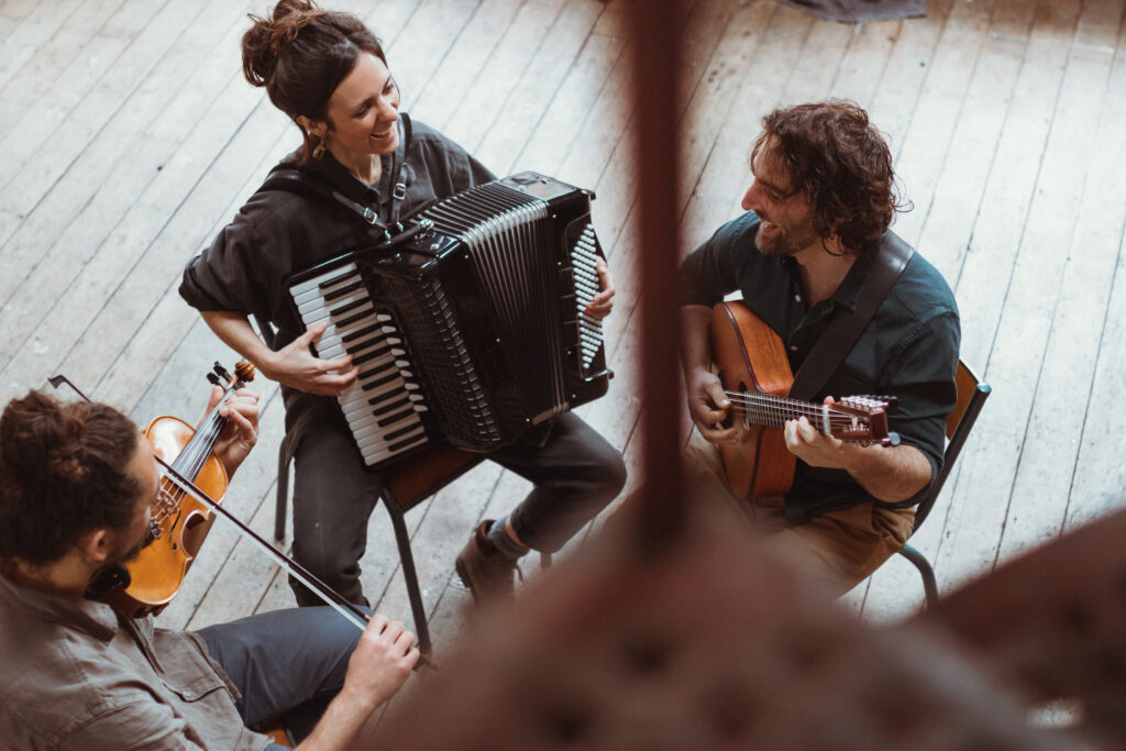 The current image has no alternative text. The file name is: ARTSTamsin-trio-by-Kate-Griffin-1-scaled.jpg